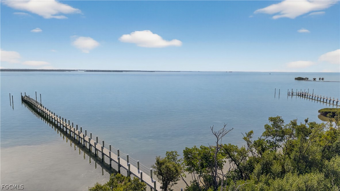 440 Useppa Island Bokeelia, FL 33922 - Photo 10 of 25 a view of a balcony with an outdoor space