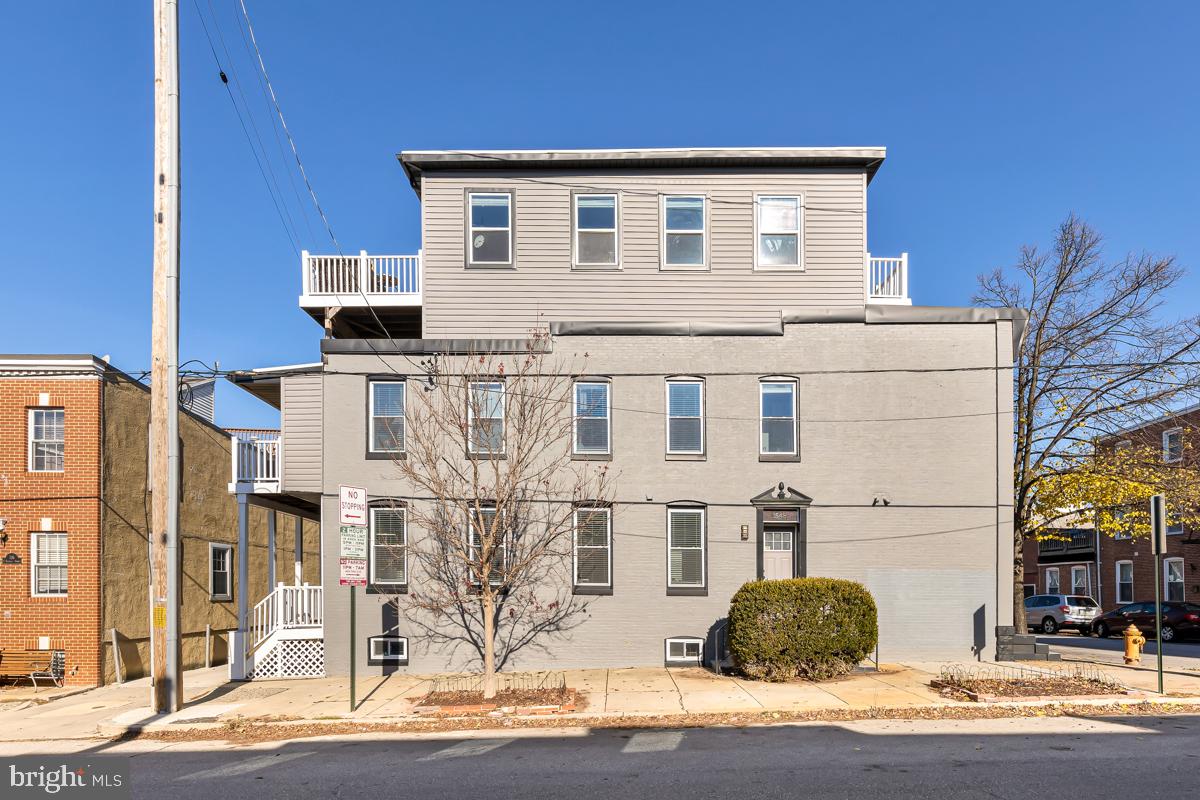 a view of a house with a street