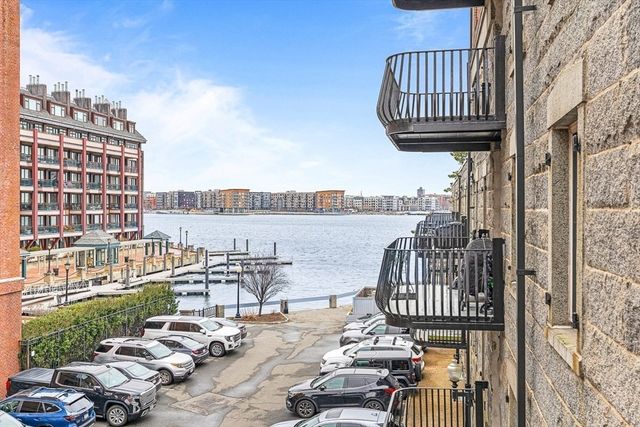 a terrace with outdoor seating and city view