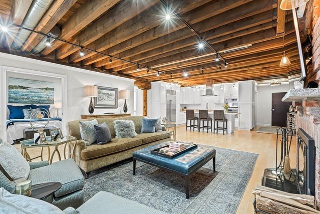 a living room with furniture and a table