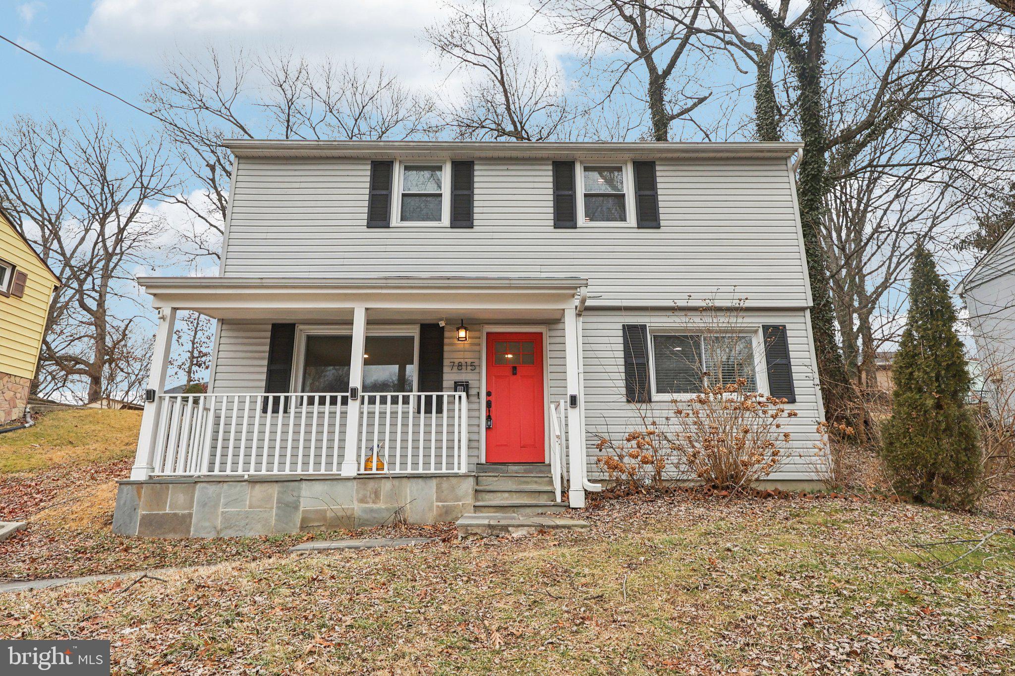 7815 Johnson Avenue Lanham, MD 20706 - Photo 1 of 1 a front view of a house with a yard