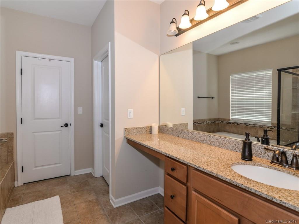 15731 Kiser Corner Lane Davidson, NC 28036 - Photo 14 of 24 a bathroom with a granite countertop double vanity sink and mirror