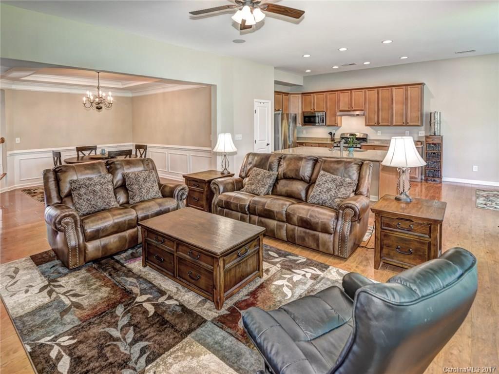 15731 Kiser Corner Lane Davidson, NC 28036 - Photo 6 of 24 a living room with furniture and kitchen view