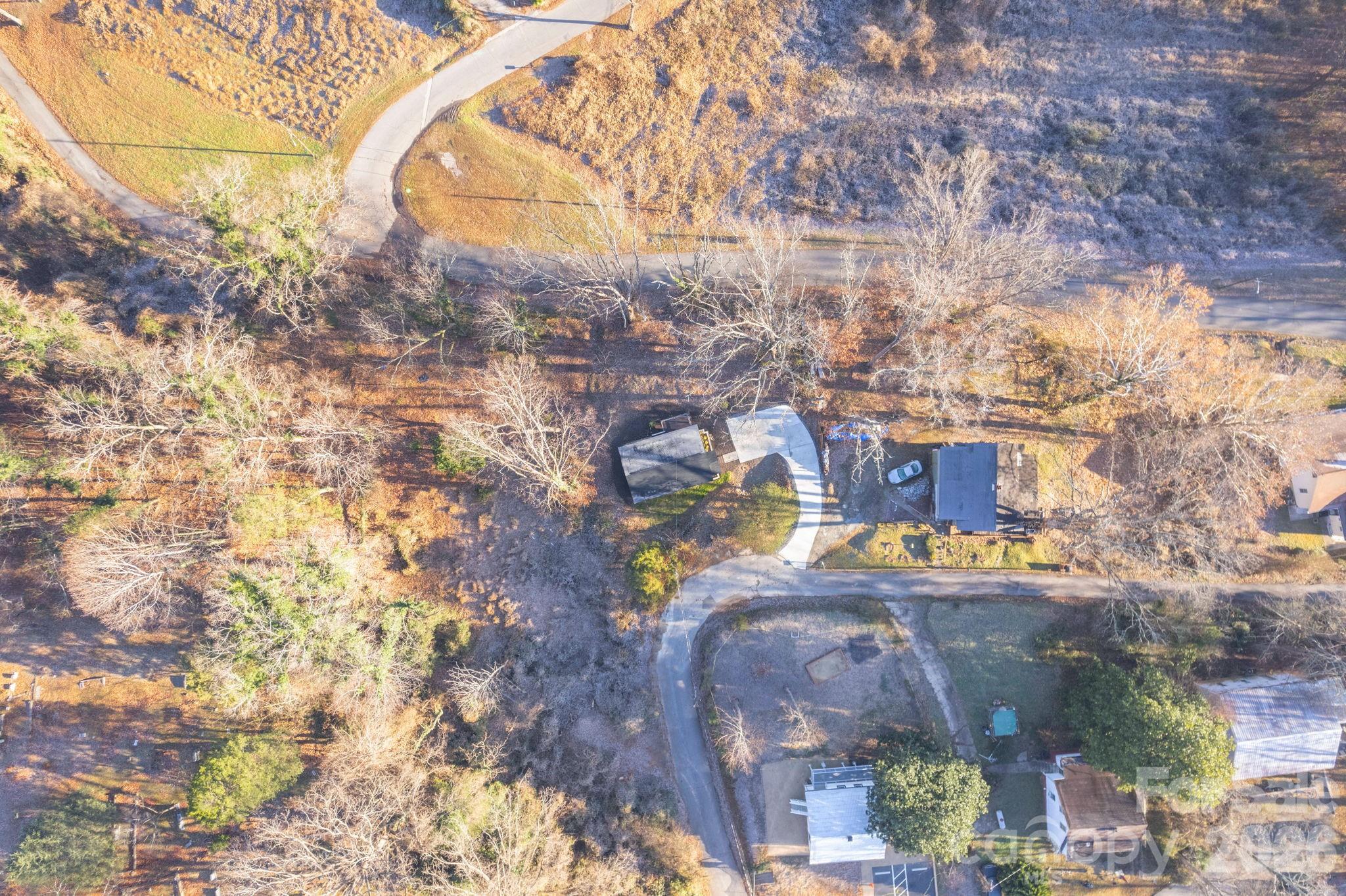 49 East Livingston Street Tryon, NC 28782 - Photo 25 of 27 a picture of houses with yard