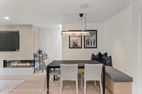 a view of a dining room with furniture