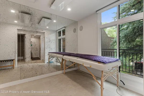 a room with a table and chairs