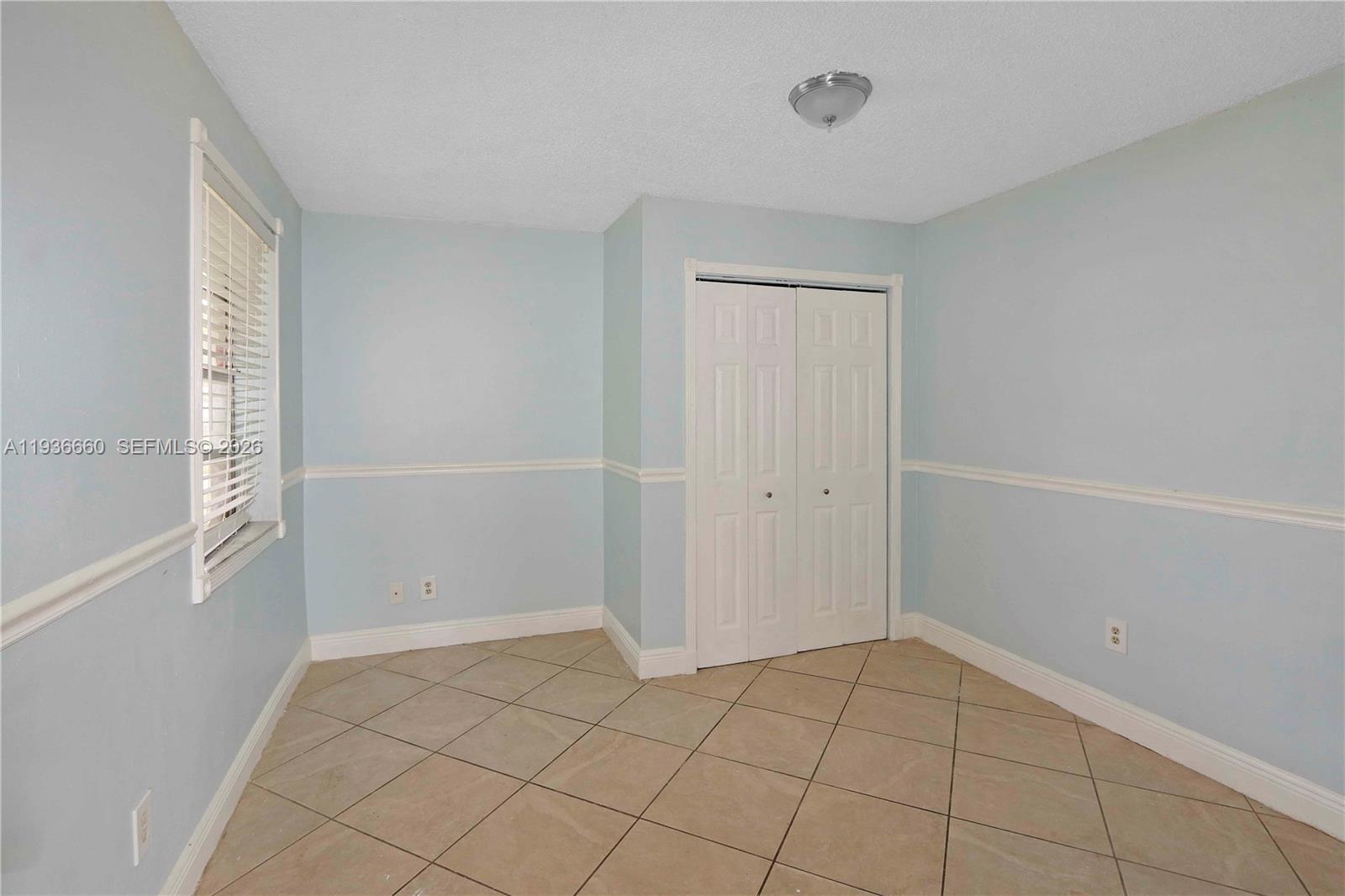 13254 Southwest 255th Terrace Homestead, FL 33032 - Photo 13 of 23 a view of an empty room