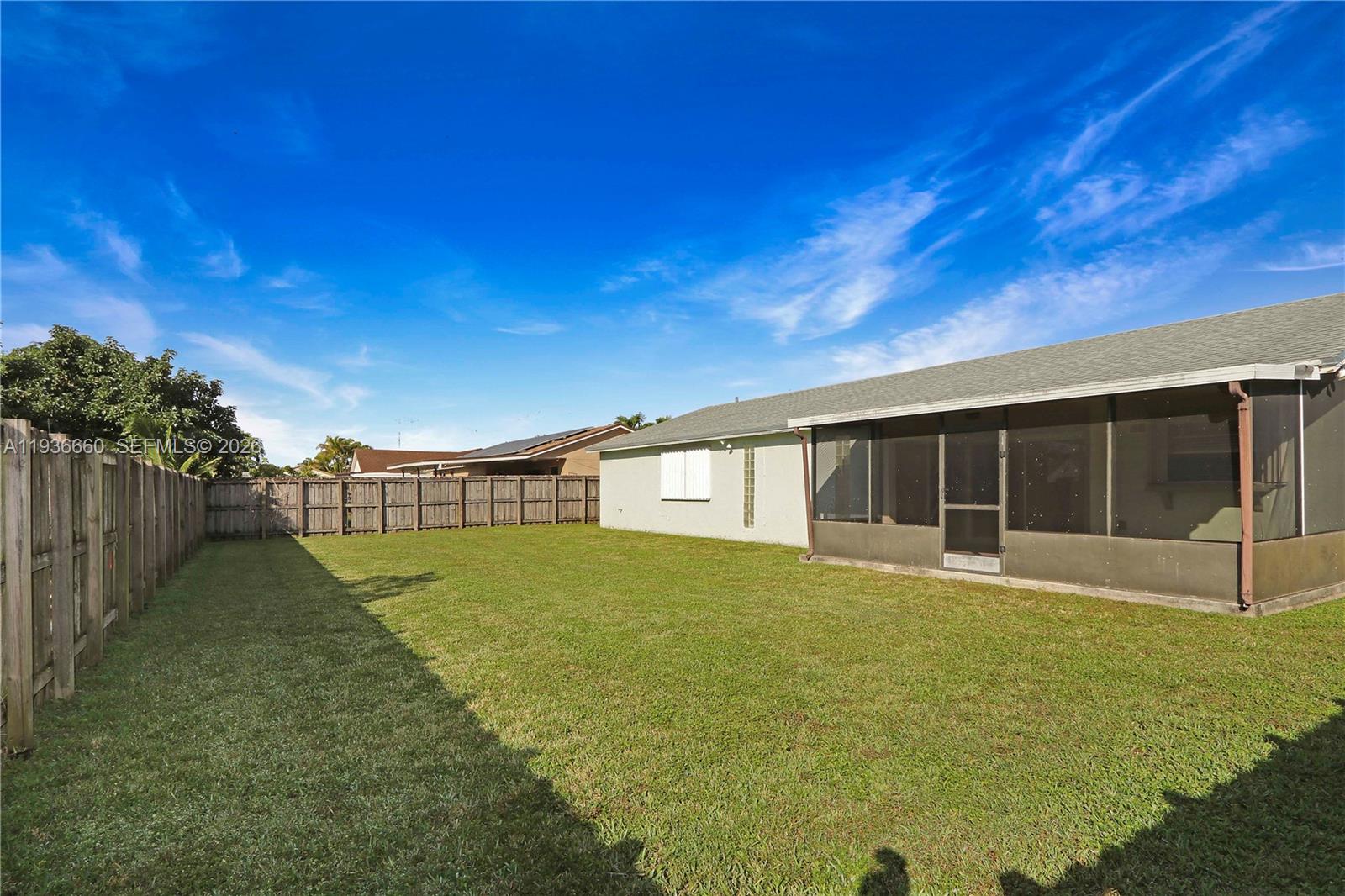 13254 Southwest 255th Terrace Homestead, FL 33032 - Photo 20 of 23 a view of a backyard with plants