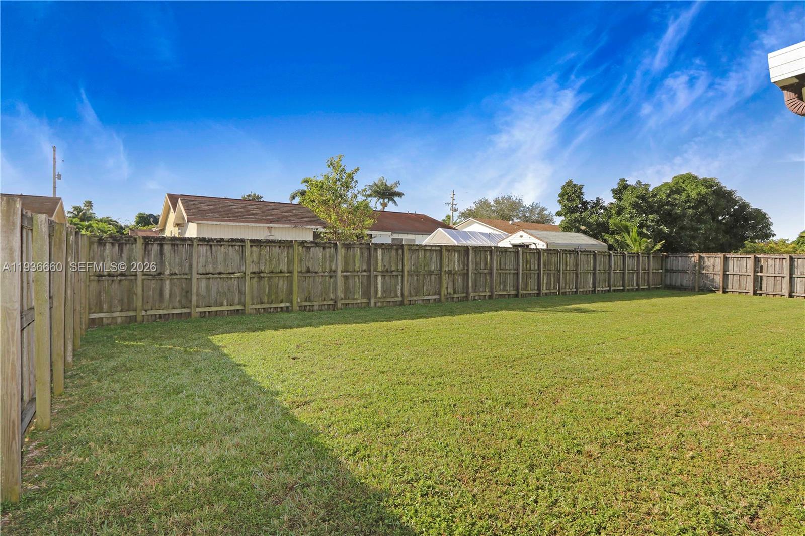 13254 Southwest 255th Terrace Homestead, FL 33032 - Photo 22 of 23 a view of a backyard