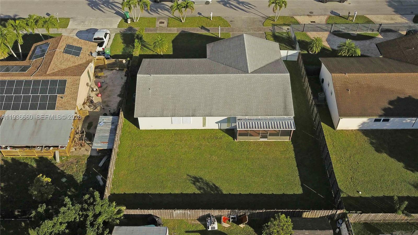 13254 Southwest 255th Terrace Homestead, FL 33032 - Photo 23 of 23 an aerial view of a residential houses with outdoor space