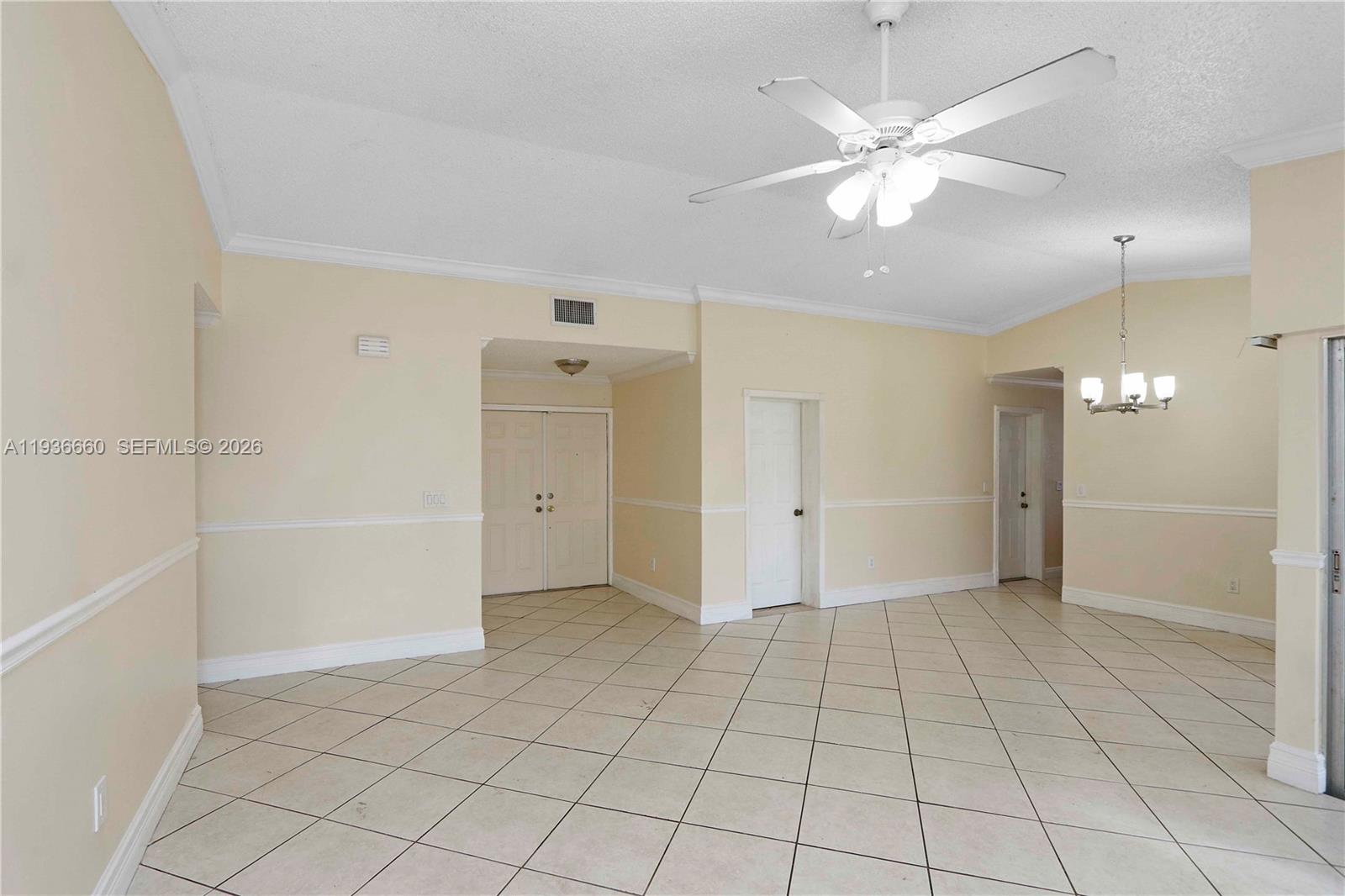13254 Southwest 255th Terrace Homestead, FL 33032 - Photo 9 of 23 an empty room with closet and fan