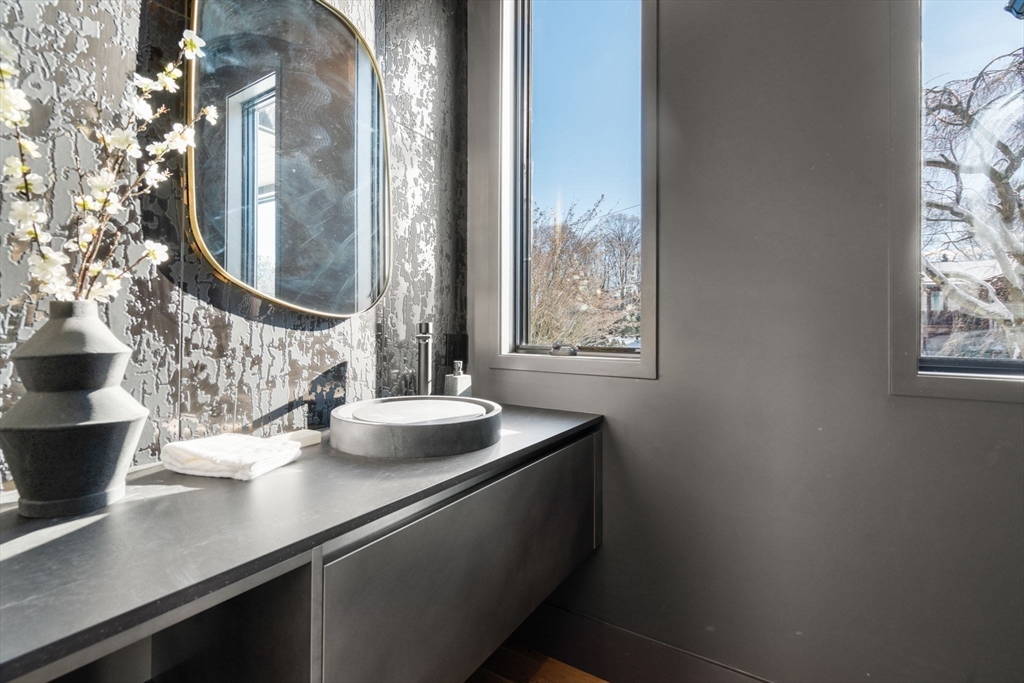 53 Countryside Road, Unit 53 Newton, MA 02459 - Photo 22 of 40 a bathroom with a sink and a mirror