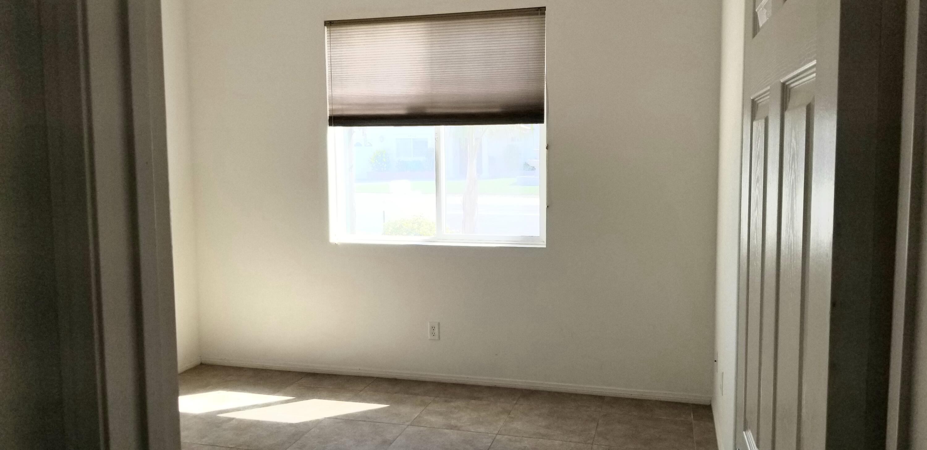 42375 Warner Trail Palm Desert, CA 92211 - Photo 14 of 33 a view of an empty room with a window