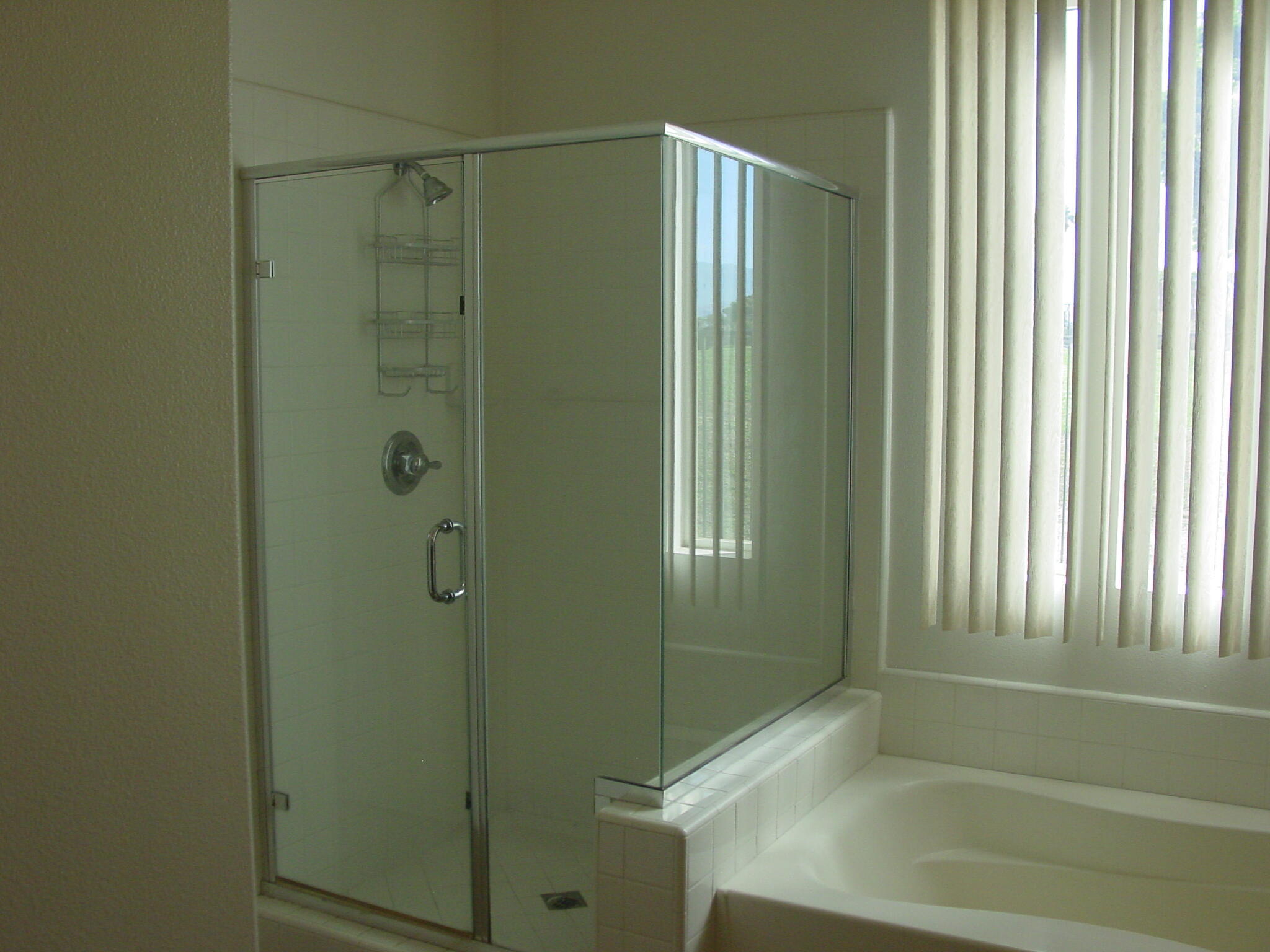 42375 Warner Trail Palm Desert, CA 92211 - Photo 17 of 33 a bathroom with a shower and a sink