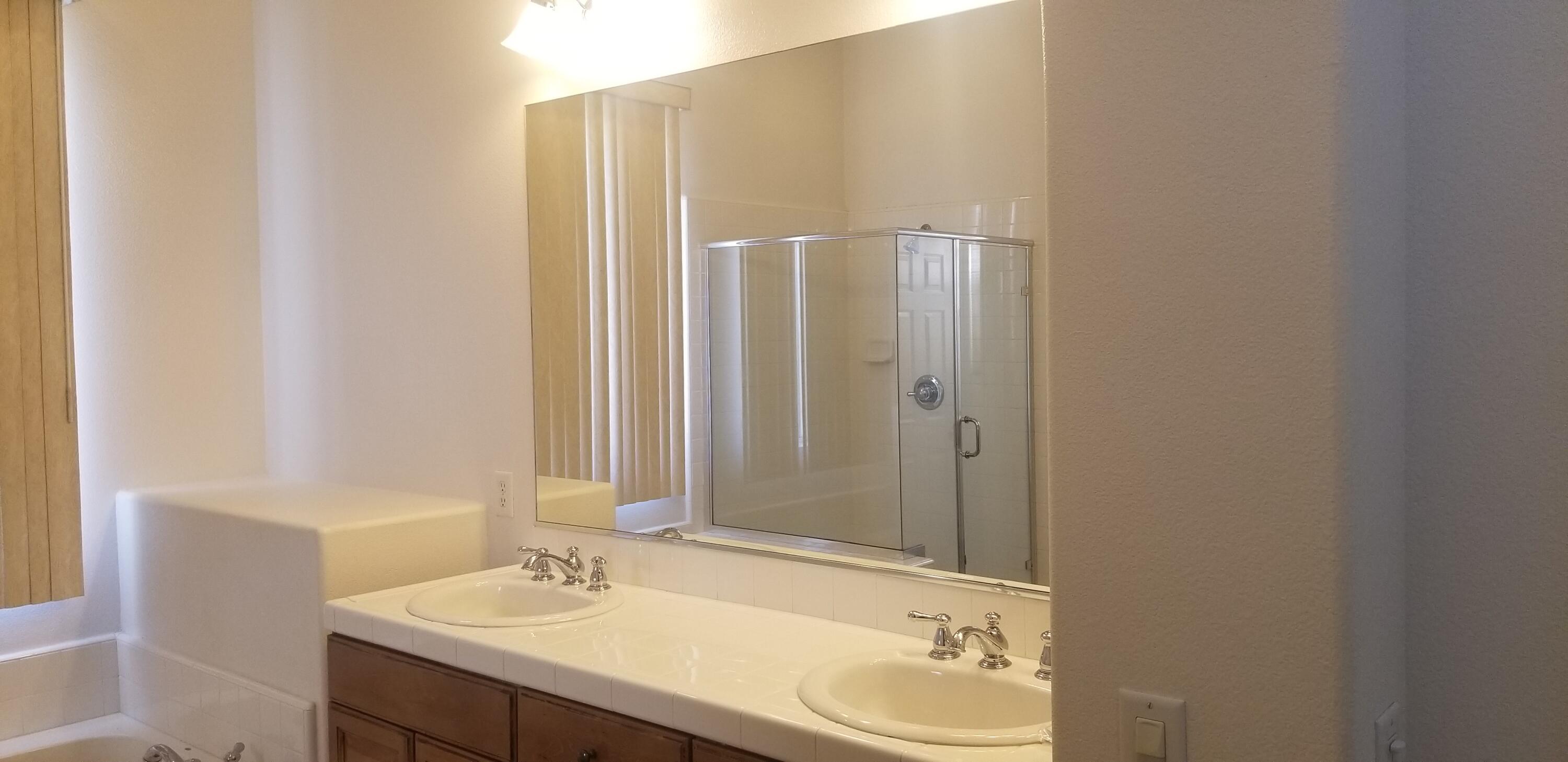 42375 Warner Trail Palm Desert, CA 92211 - Photo 18 of 33 a bathroom with a sink and a mirror