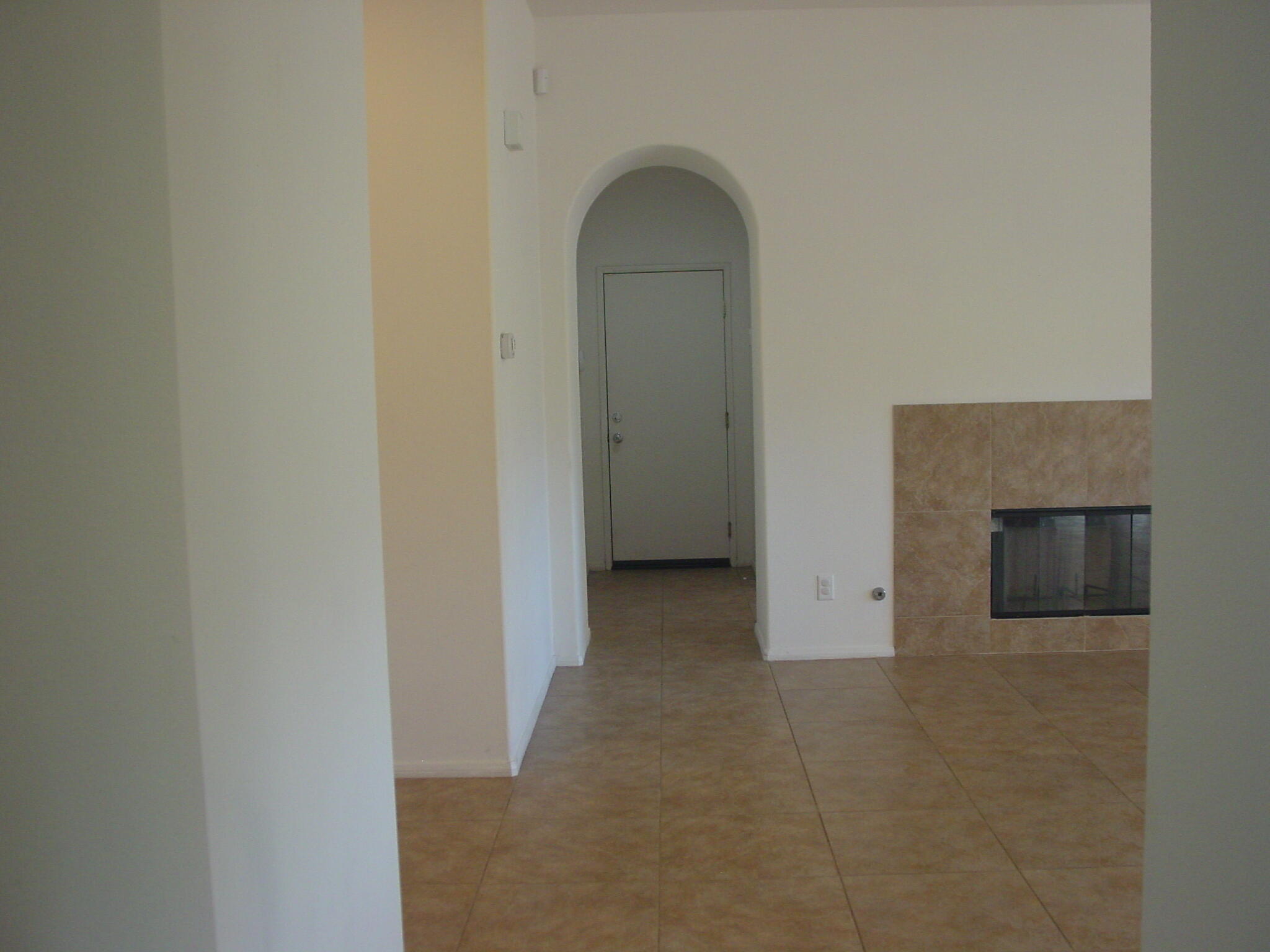 42375 Warner Trail Palm Desert, CA 92211 - Photo 10 of 33 a view of a livingroom with an empty space and a fireplace