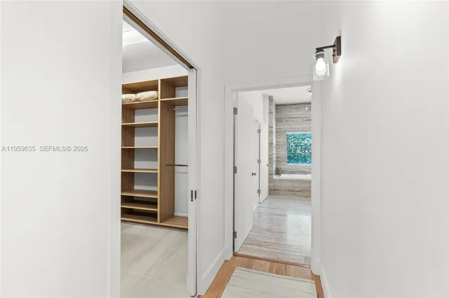 a kitchen with a cabinets and window
