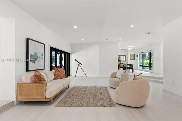 a living room with furniture and a couch