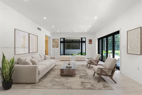 a living room with furniture or window and a table