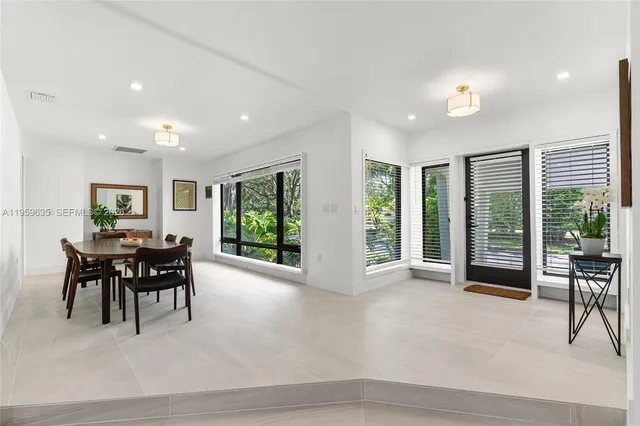 a view of a livingroom with furniture window and outside view
