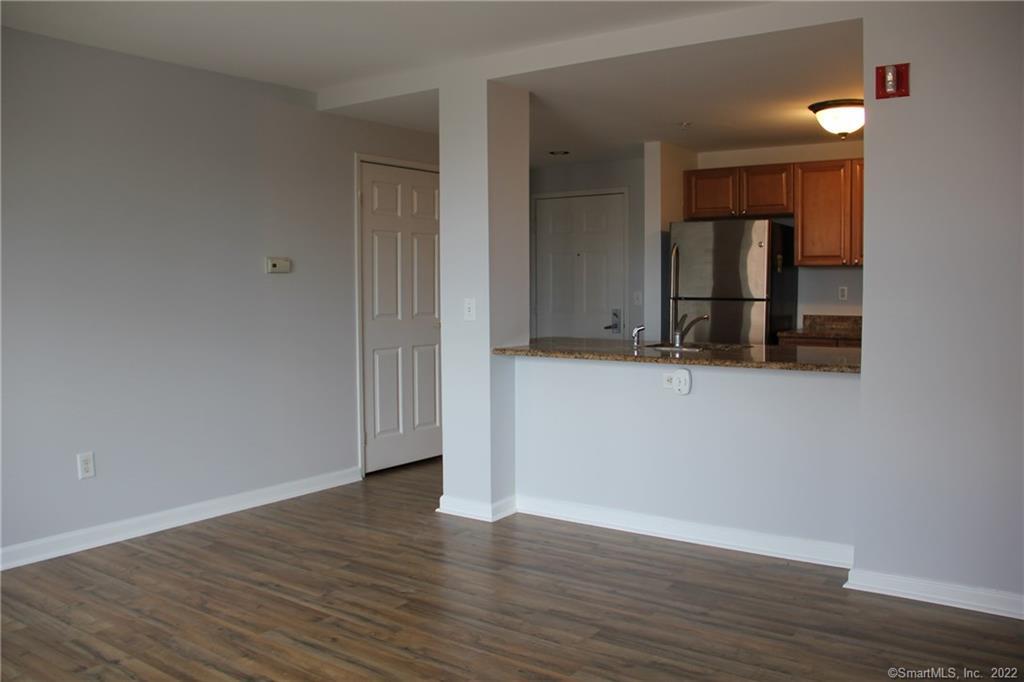 300 Broad Street, Unit 607 Stamford, CT 06901 - Photo 11 of 25 wooden floor in an empty room