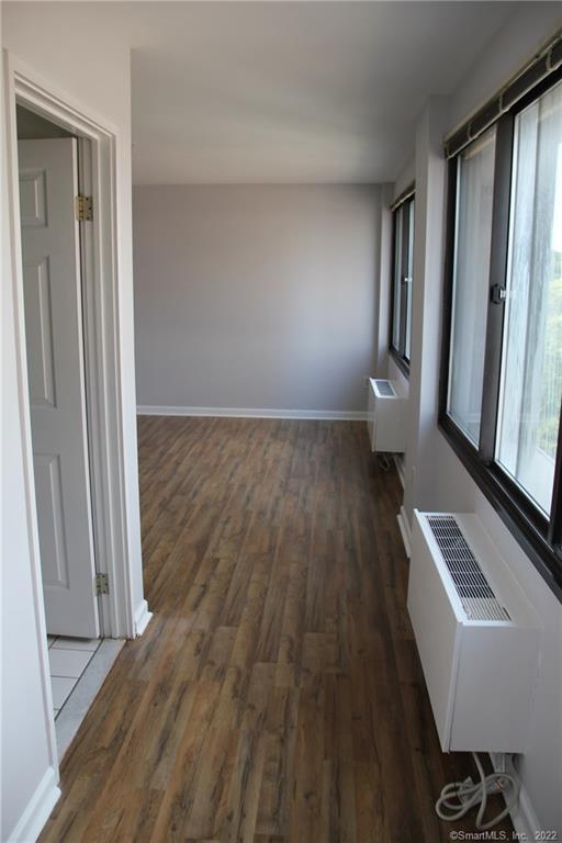 300 Broad Street, Unit 607 Stamford, CT 06901 - Photo 17 of 25 wooden floor and window in a room