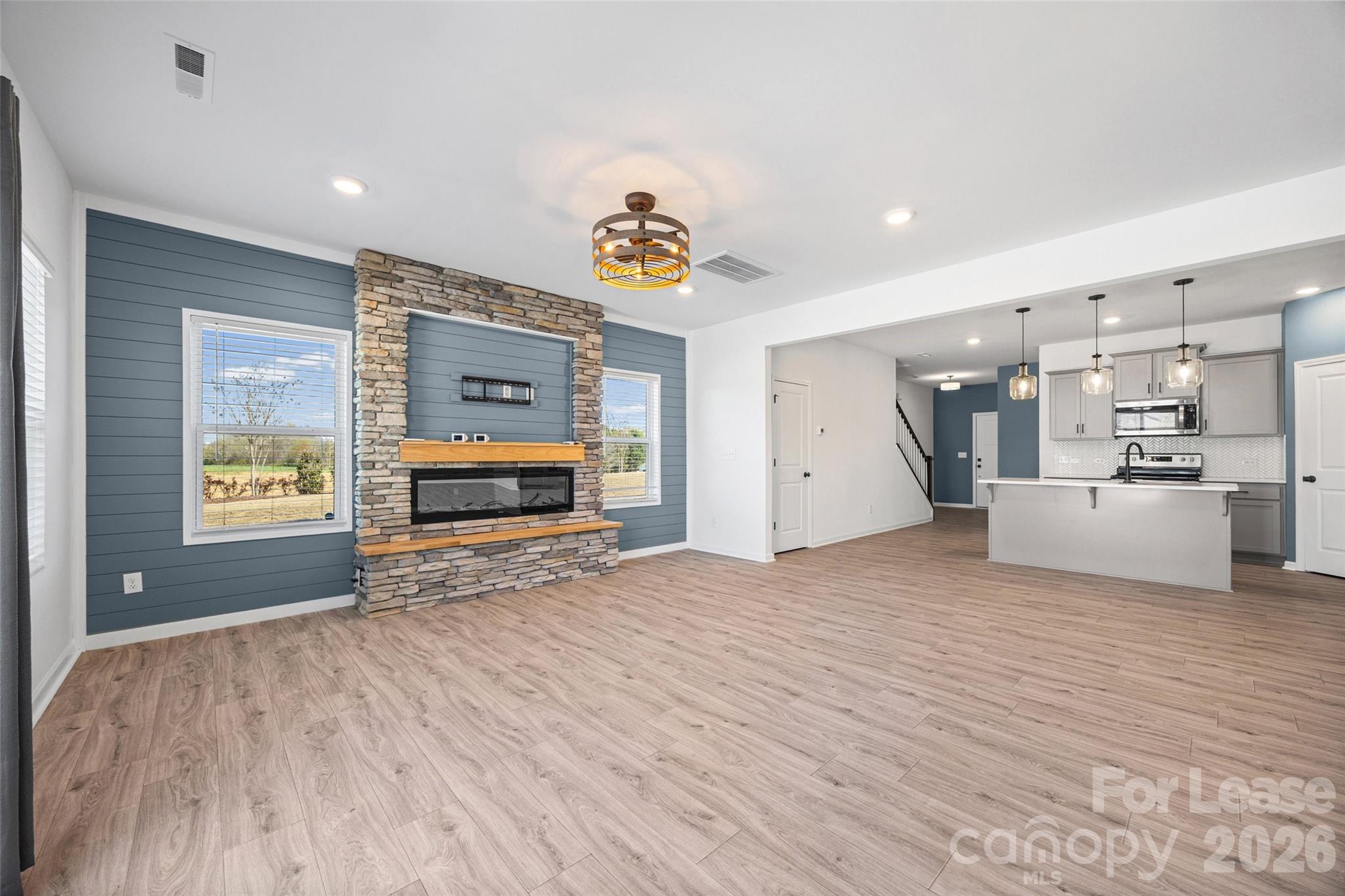 512 Station Street Clover, SC 29710 - Photo 11 of 34 a view of empty room with a window and fireplace