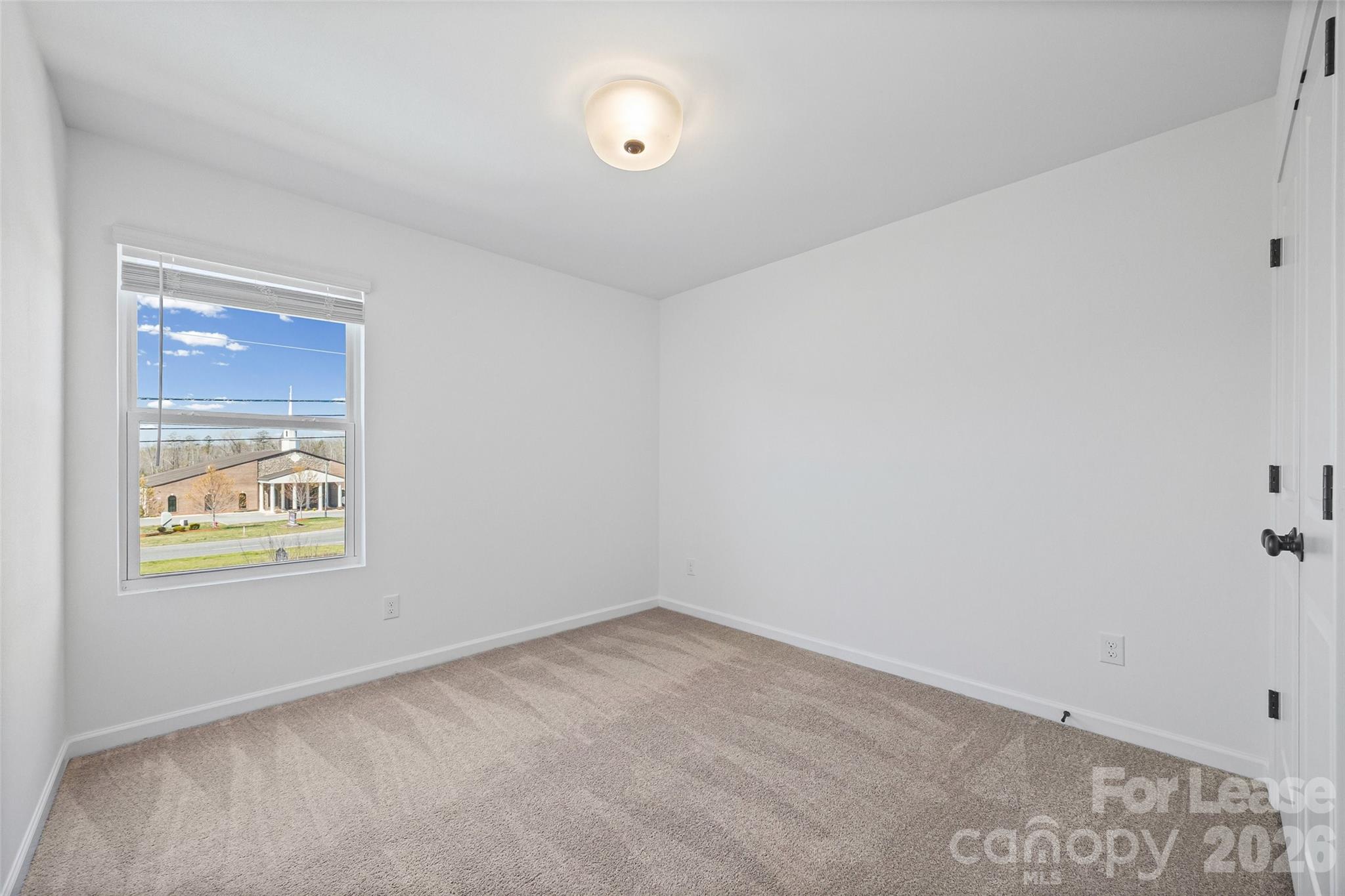 512 Station Street Clover, SC 29710 - Photo 15 of 34 an empty room with a window