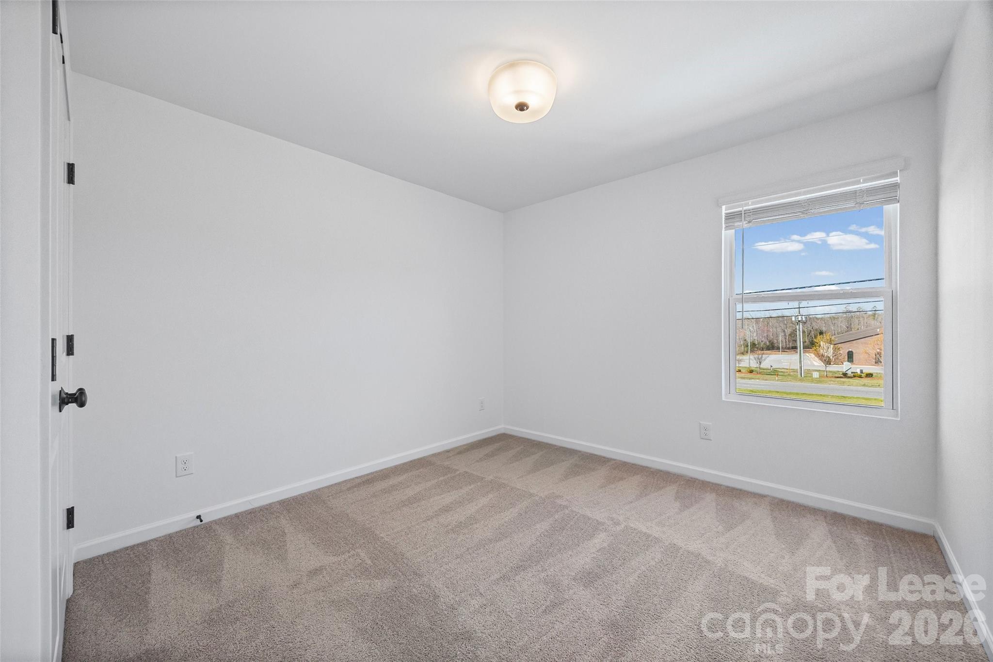 512 Station Street Clover, SC 29710 - Photo 16 of 34 an empty room with windows