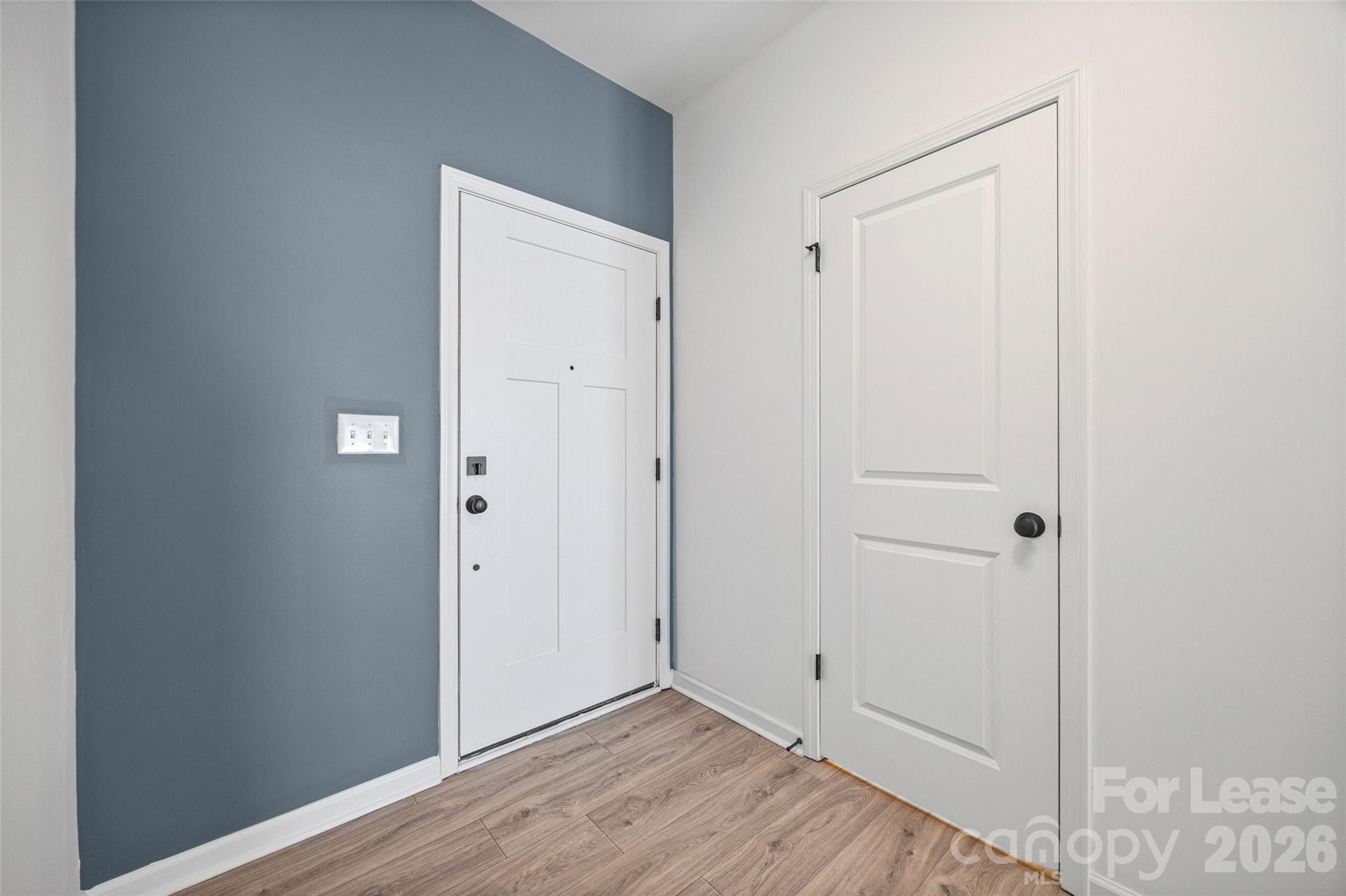 512 Station Street Clover, SC 29710 - Photo 3 of 34 a view of an empty room with wooden floor