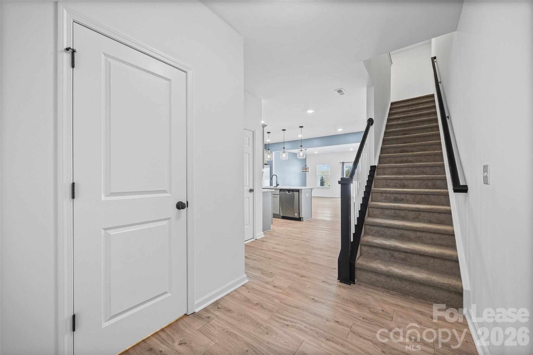 512 Station Street Clover, SC 29710 - Photo 4 of 34 a view of a hallway with wooden floor and entryway