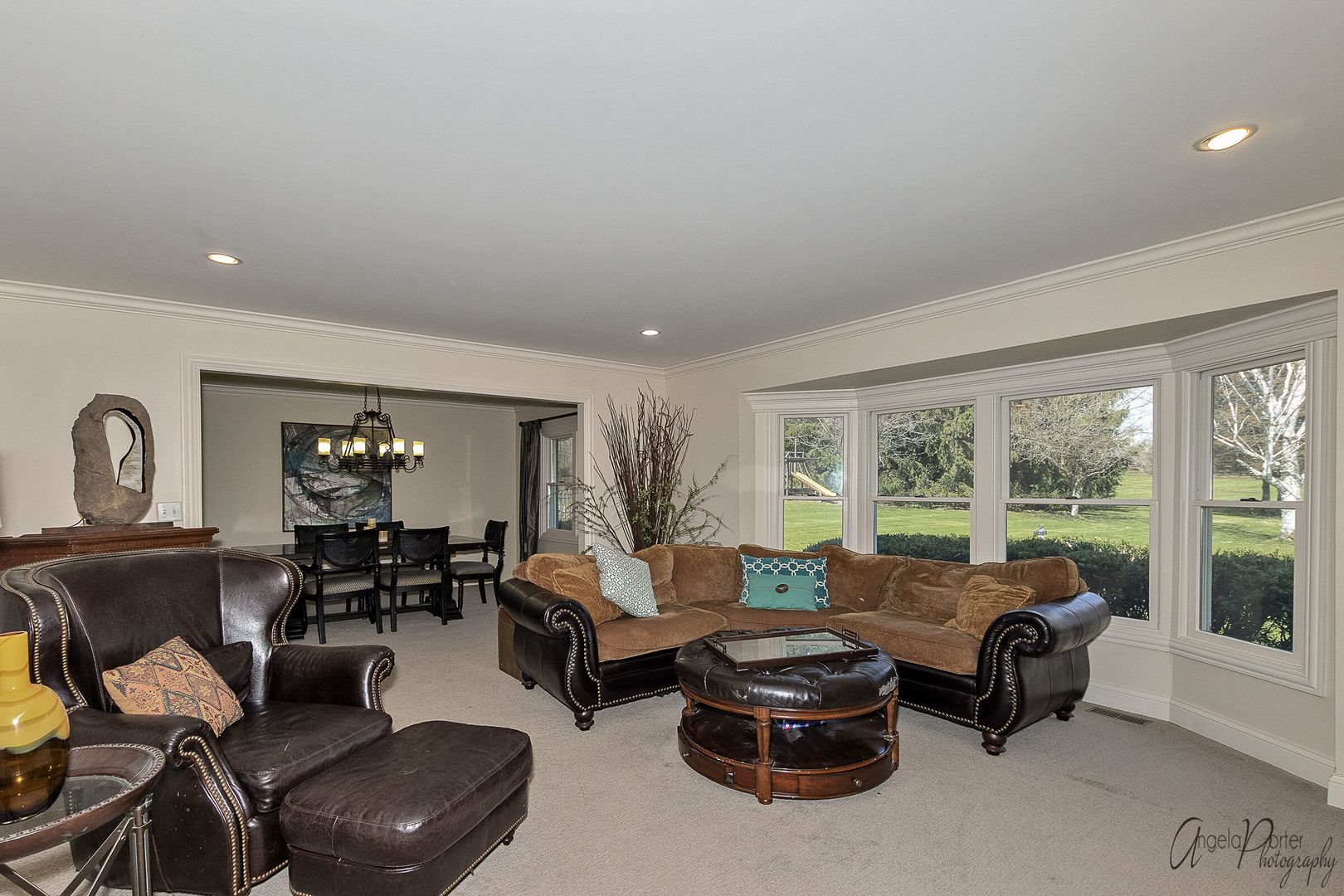 1018 Sunset Road Spring Grove, IL 60081 - Photo 17 of 54 a living room with furniture and large windows