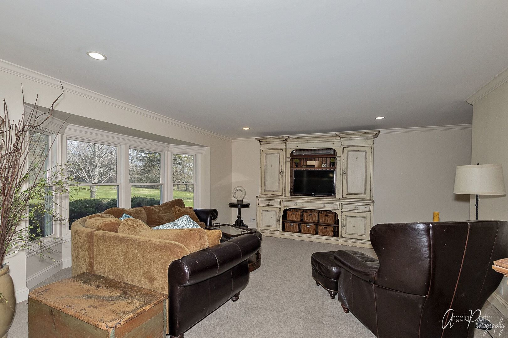 1018 Sunset Road Spring Grove, IL 60081 - Photo 18 of 54 a living room with furniture and a flat screen tv