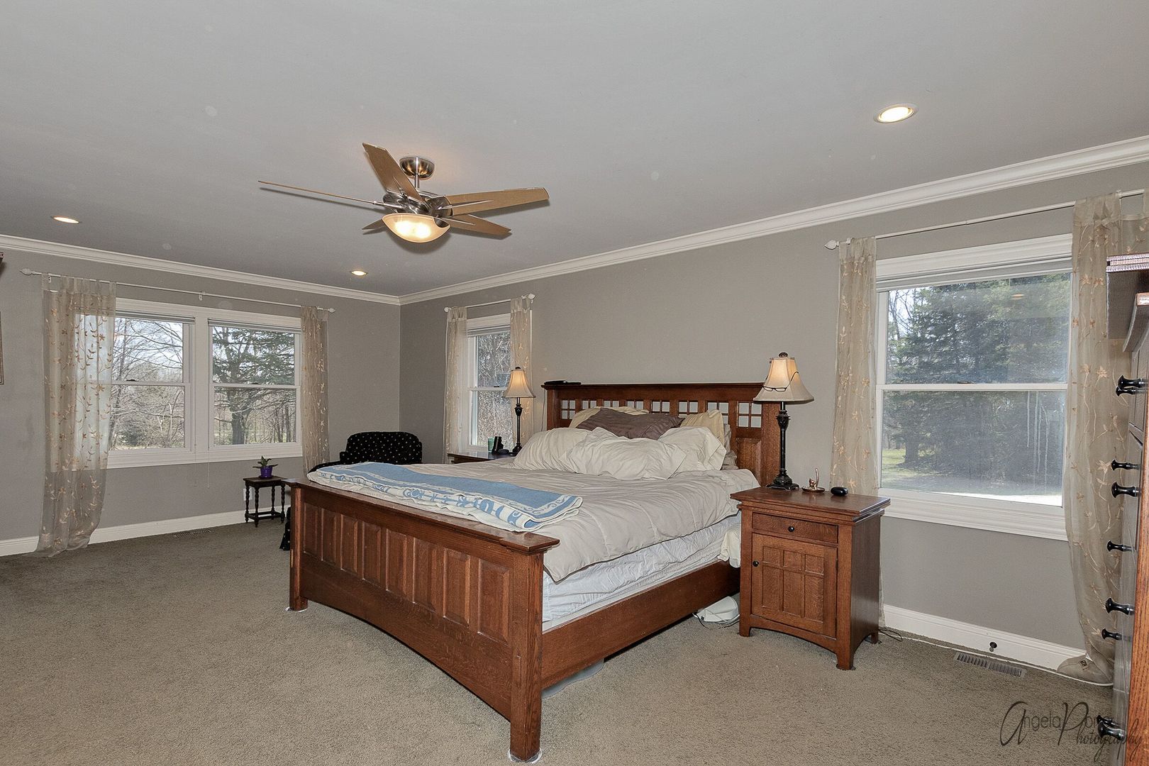 1018 Sunset Road Spring Grove, IL 60081 - Photo 19 of 54 a bedroom with a bed and window