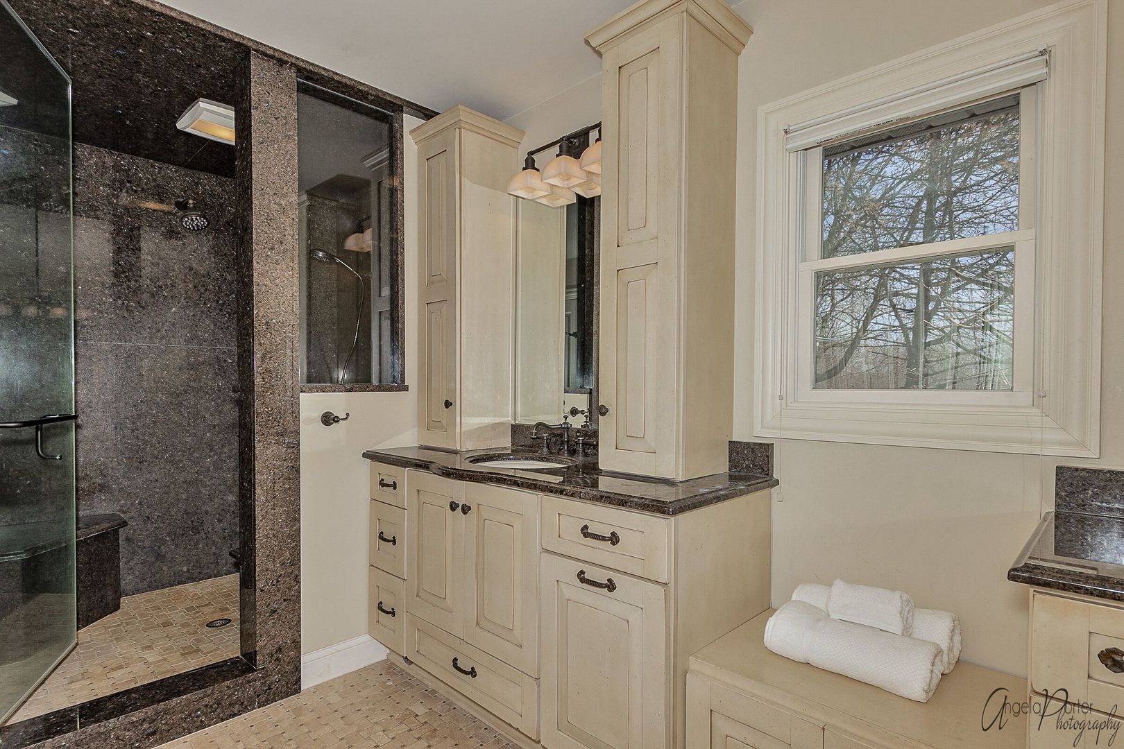 1018 Sunset Road Spring Grove, IL 60081 - Photo 22 of 54 a bathroom with a double vanity sink and a shower