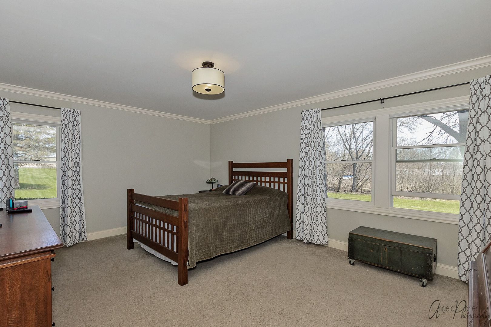 1018 Sunset Road Spring Grove, IL 60081 - Photo 24 of 54 a living room with furniture and a window