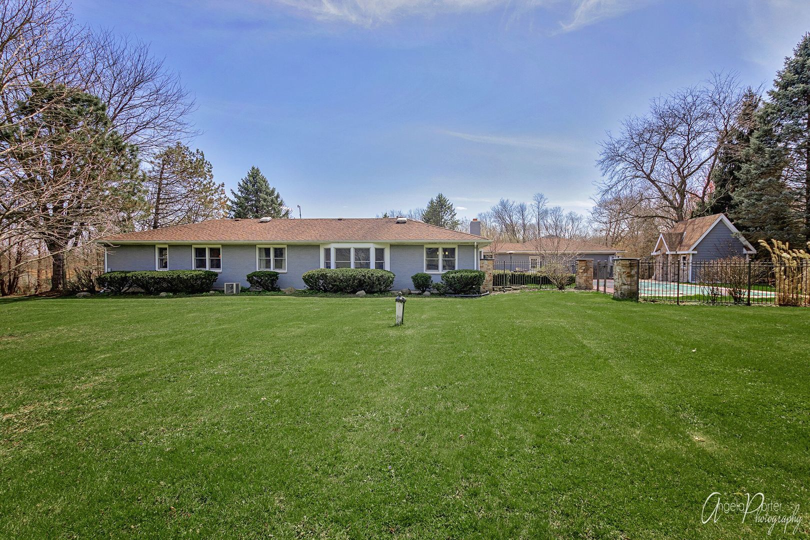 1018 Sunset Road Spring Grove, IL 60081 - Photo 42 of 54 a front view of house with yard outdoor seating and green space