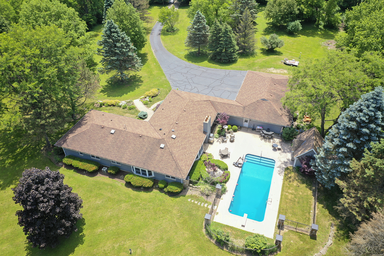 1018 Sunset Road Spring Grove, IL 60081 - Photo 49 of 54 an aerial view of a house with a swimming pool