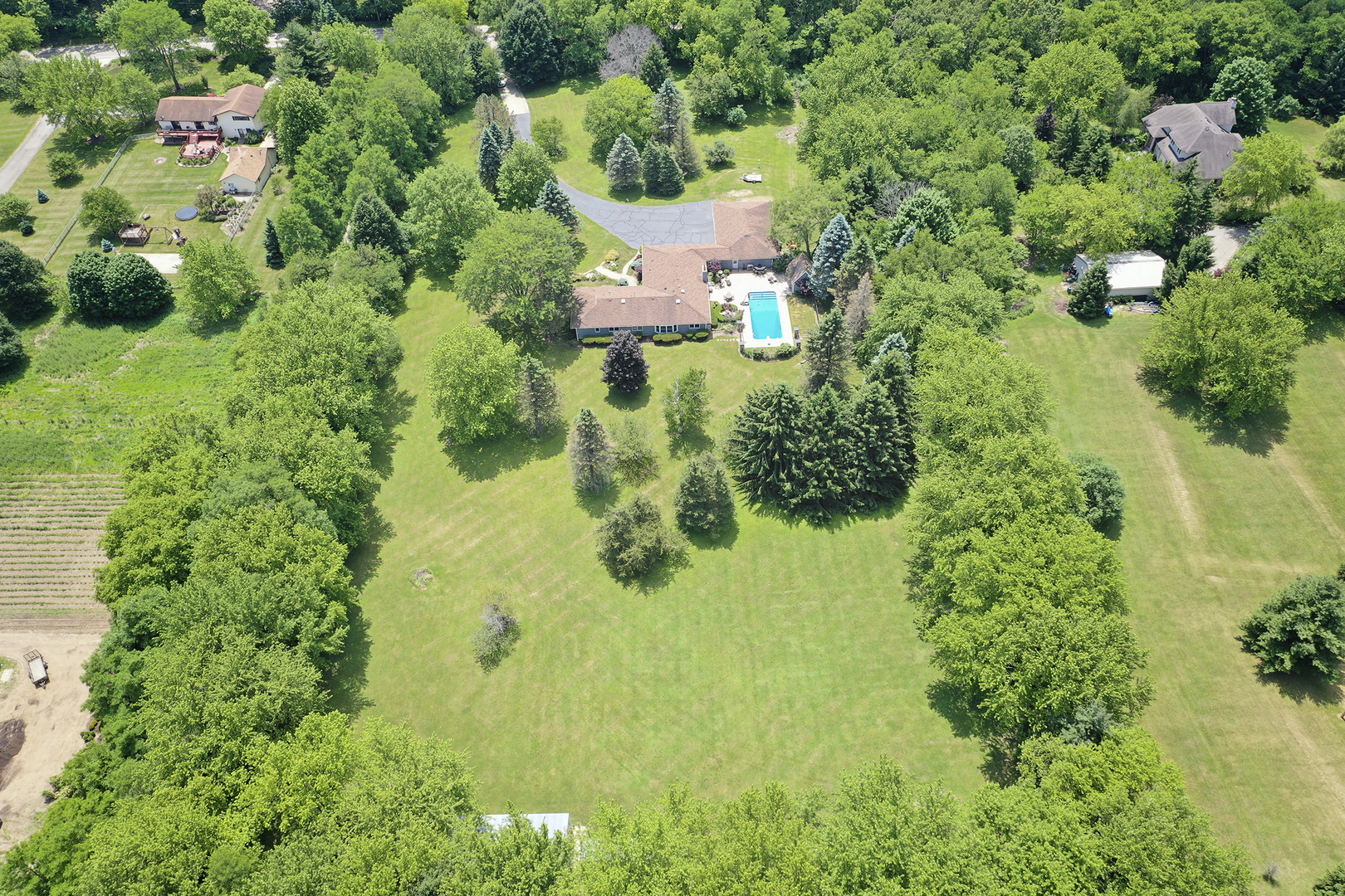 1018 Sunset Road Spring Grove, IL 60081 - Photo 53 of 54 an aerial view of residential house with outdoor space and trees all around