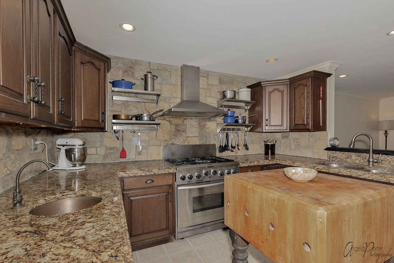 1018 Sunset Road Spring Grove, IL 60081 - Photo 10 of 54 a kitchen with stainless steel appliances granite countertop a sink stove and cabinets