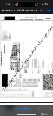 a black and white photo of a living room