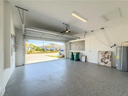a view of a livingroom with an empty space and a window