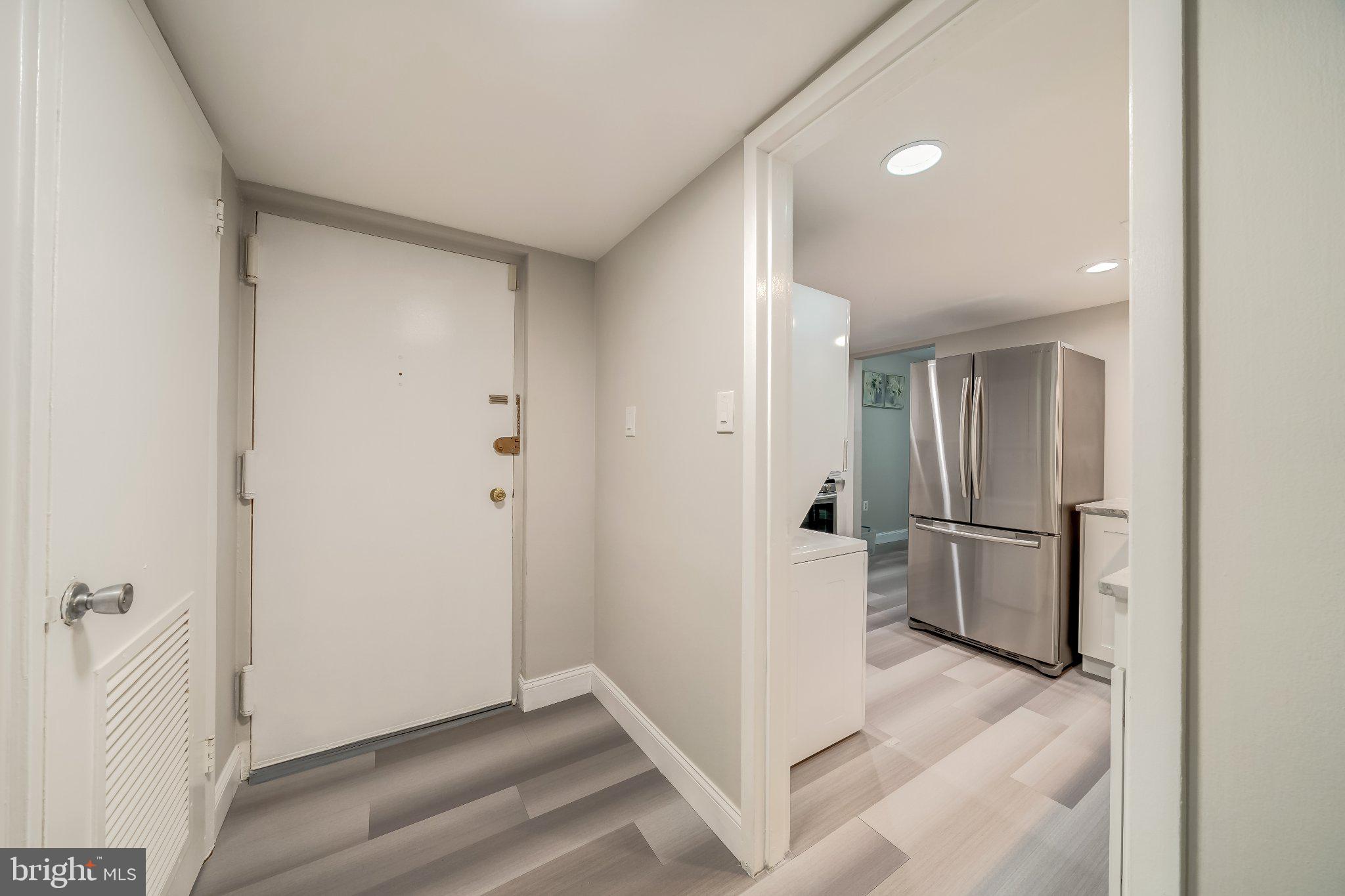 Modern entryway with sleek finishes.