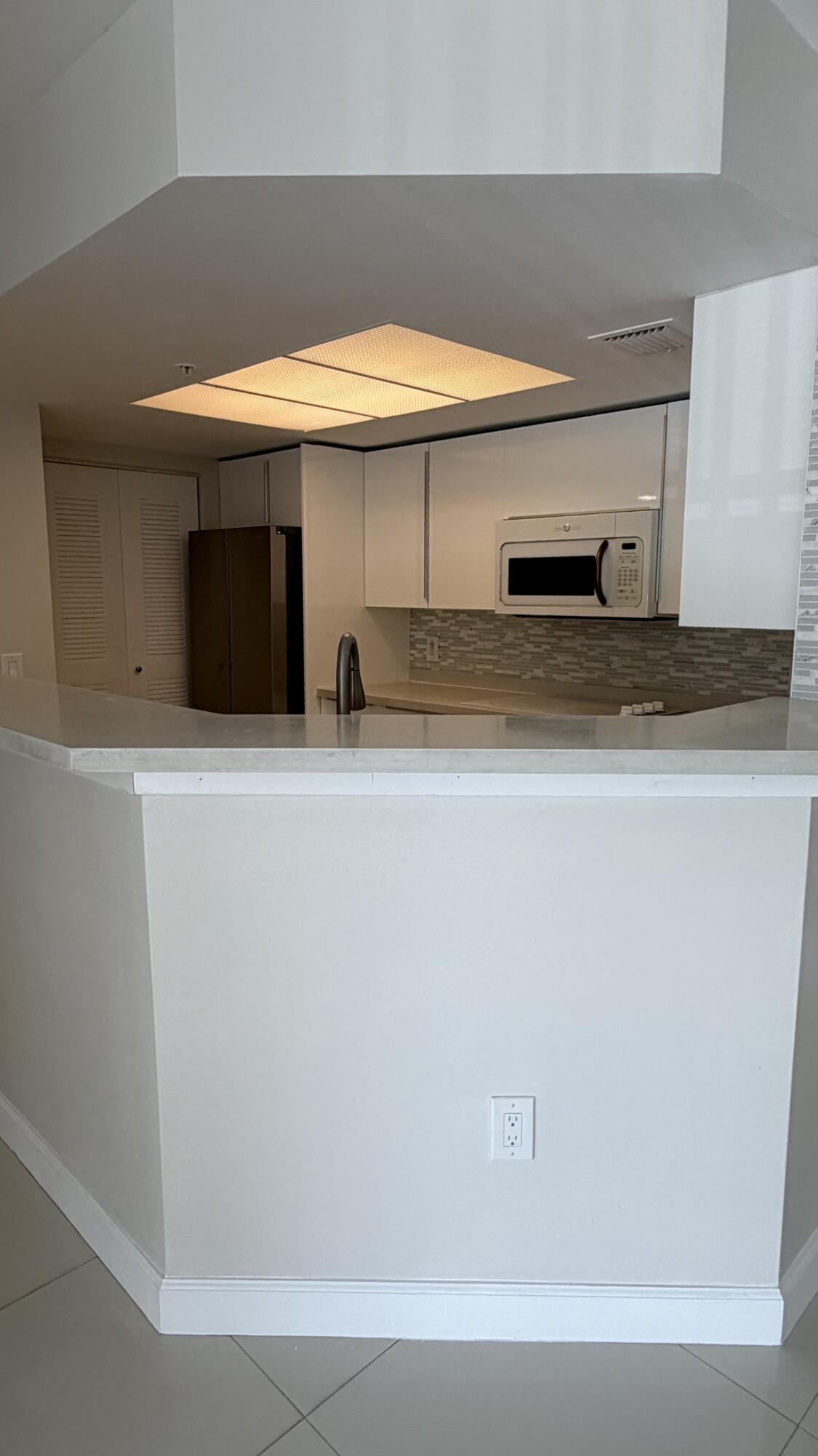 5065 Wiles Road, Unit 207 Coconut Creek, FL 33073 - Photo 4 of 32 IMG_6717