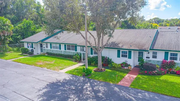 a house with garden in front of it