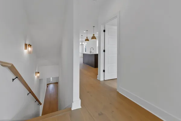 a view of a hallway with an entryway
