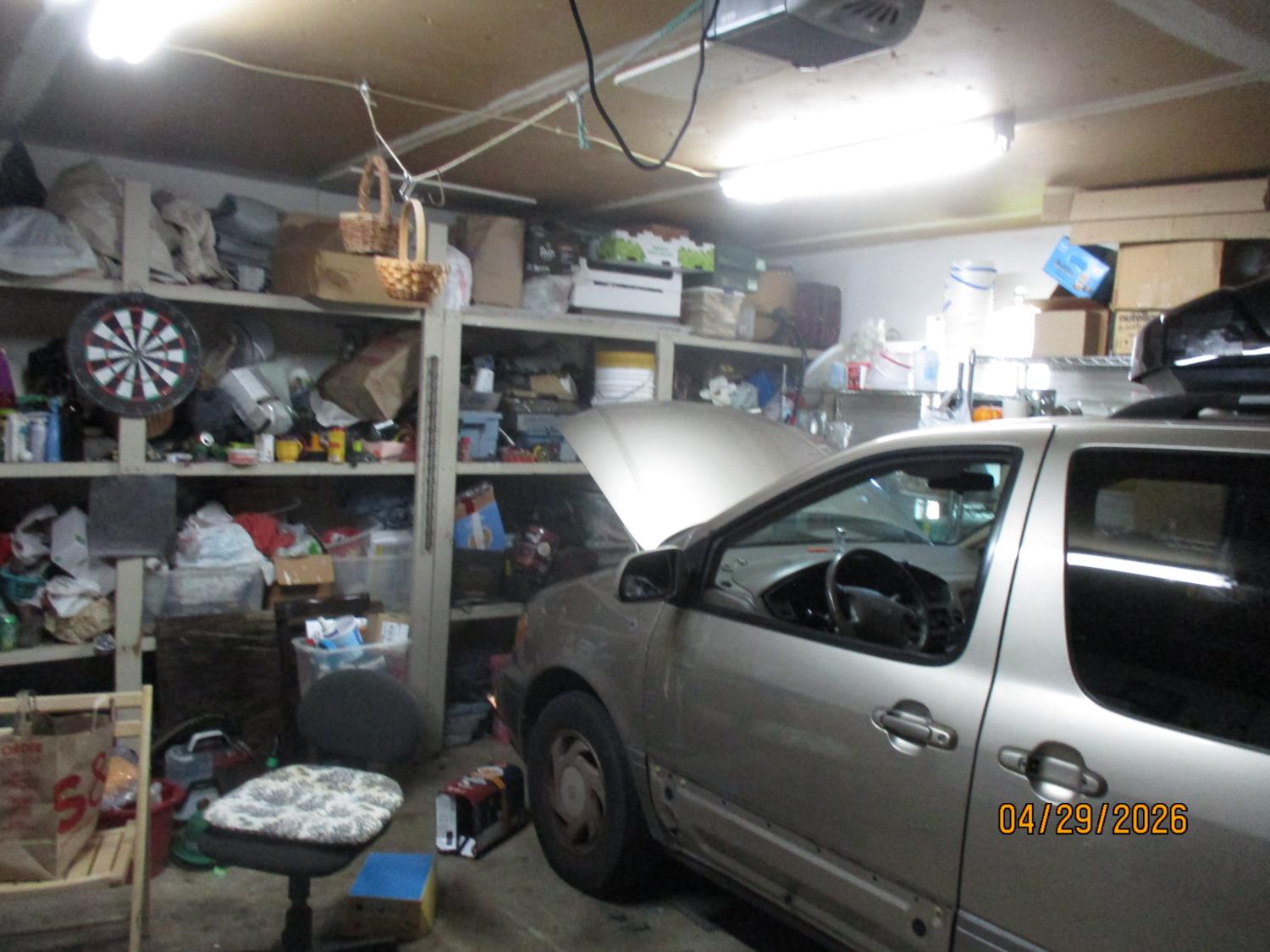 11024 Autumnwind Lane Rancho Cordova, CA 95670 - Photo 19 of 36 a view of a garage with stuff