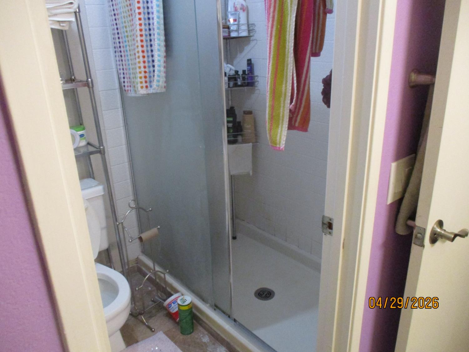 11024 Autumnwind Lane Rancho Cordova, CA 95670 - Photo 20 of 36 a bathroom with a shower and toilet