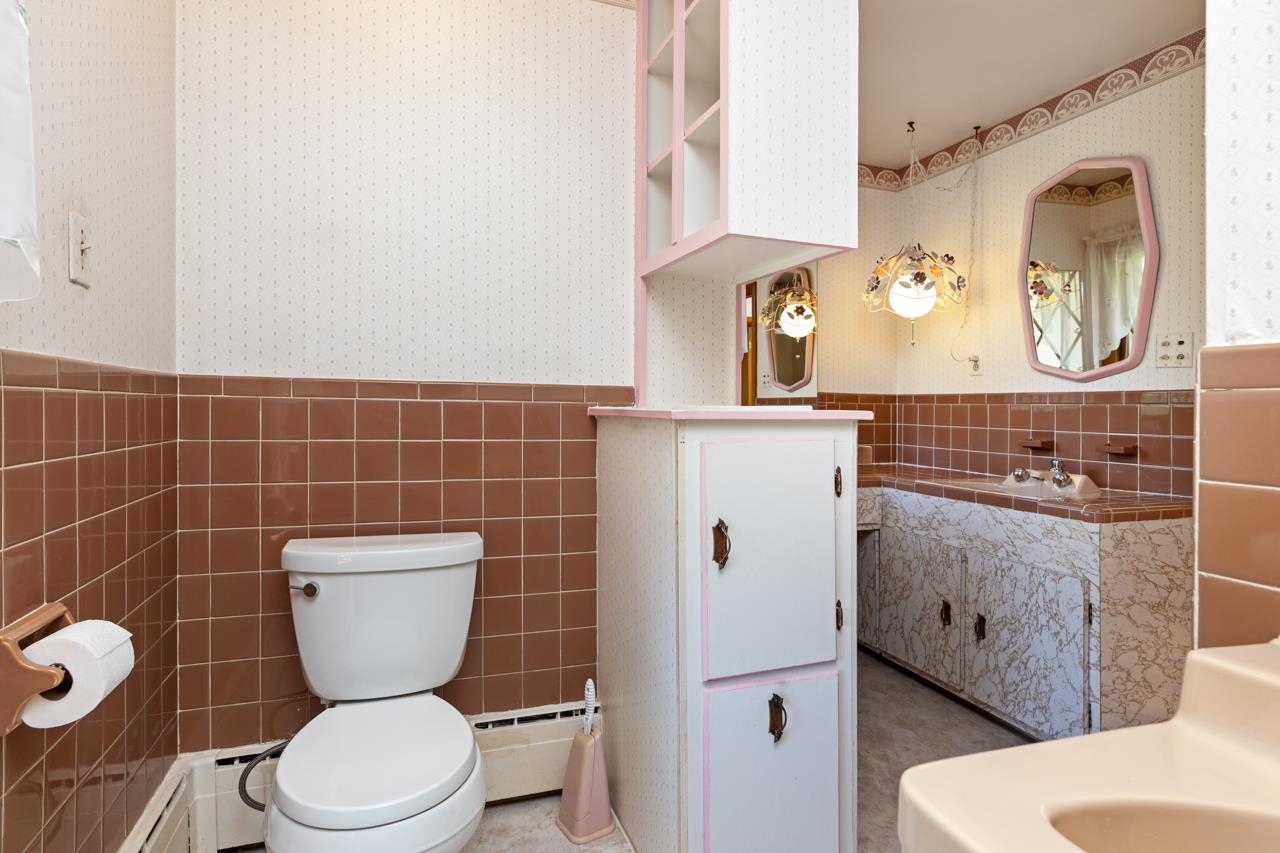 27 Cattle Scales Road Waynesboro, VA 22980 - Photo 26 of 55 a bathroom with a toilet a sink and a mirror