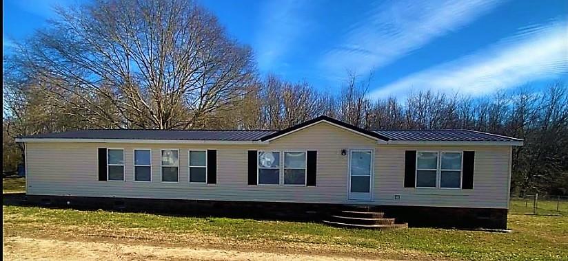 180 Tryon Road Rockwell, NC 28138 - Photo 1 of 31 a front view of a house with a yard